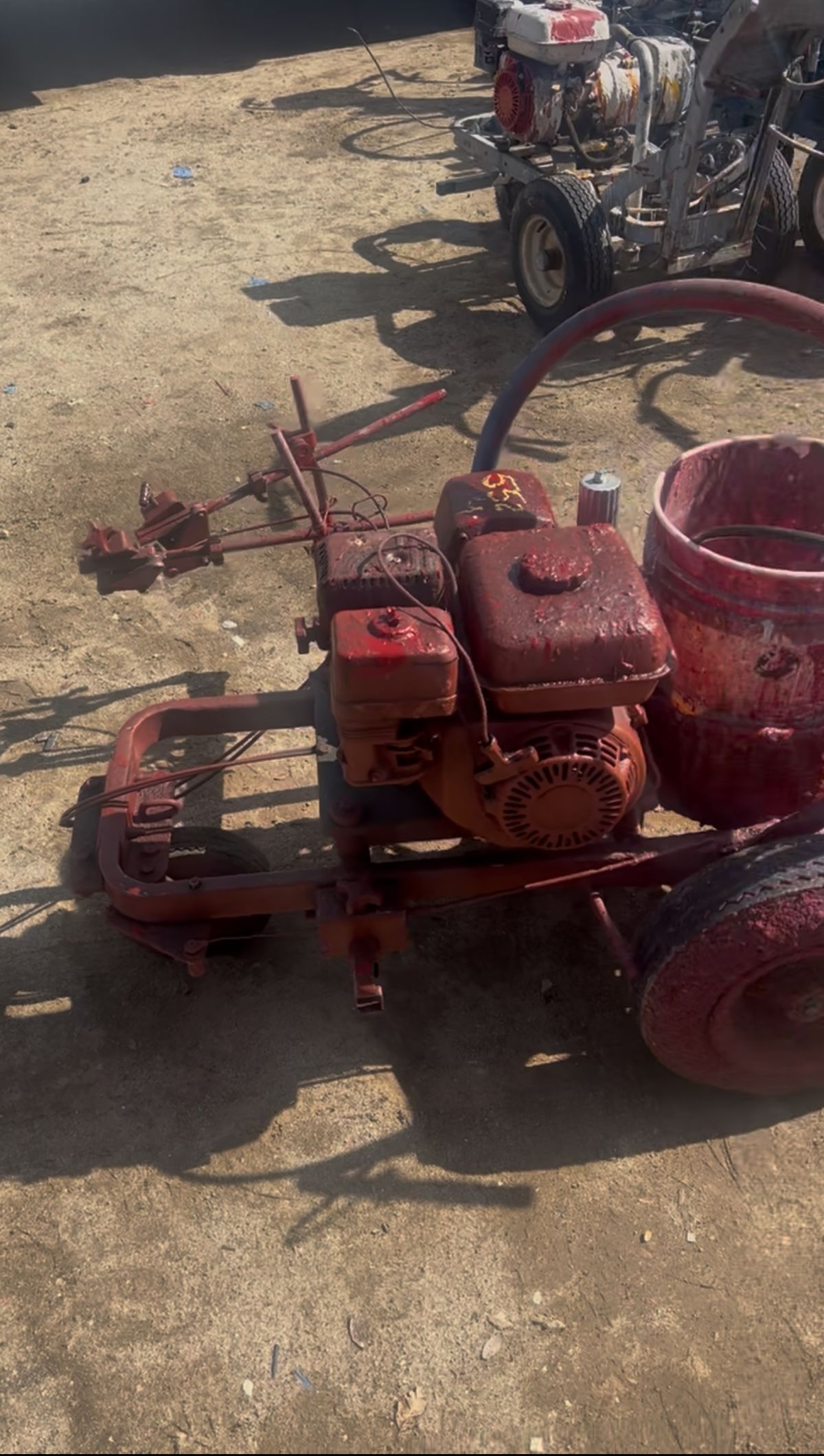 Graco GM 3500 before repair — covered in red paint