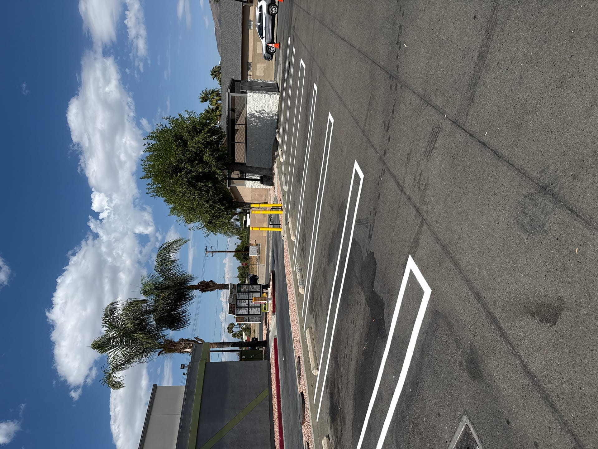 Striping on fresh sealcoat